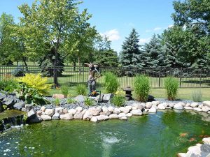 water features - natural looking streams and ponds - focal point landscapes with soothing movement and sound